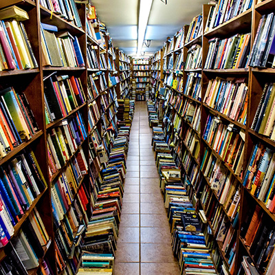 A bookstore with narrow, crowded aisles.